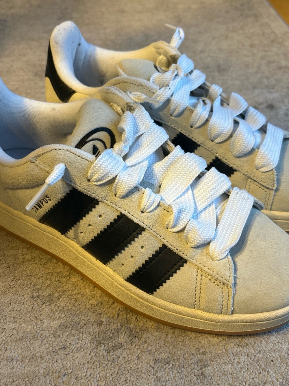 adidas Off-White Suede Sneakers with Black Stripes